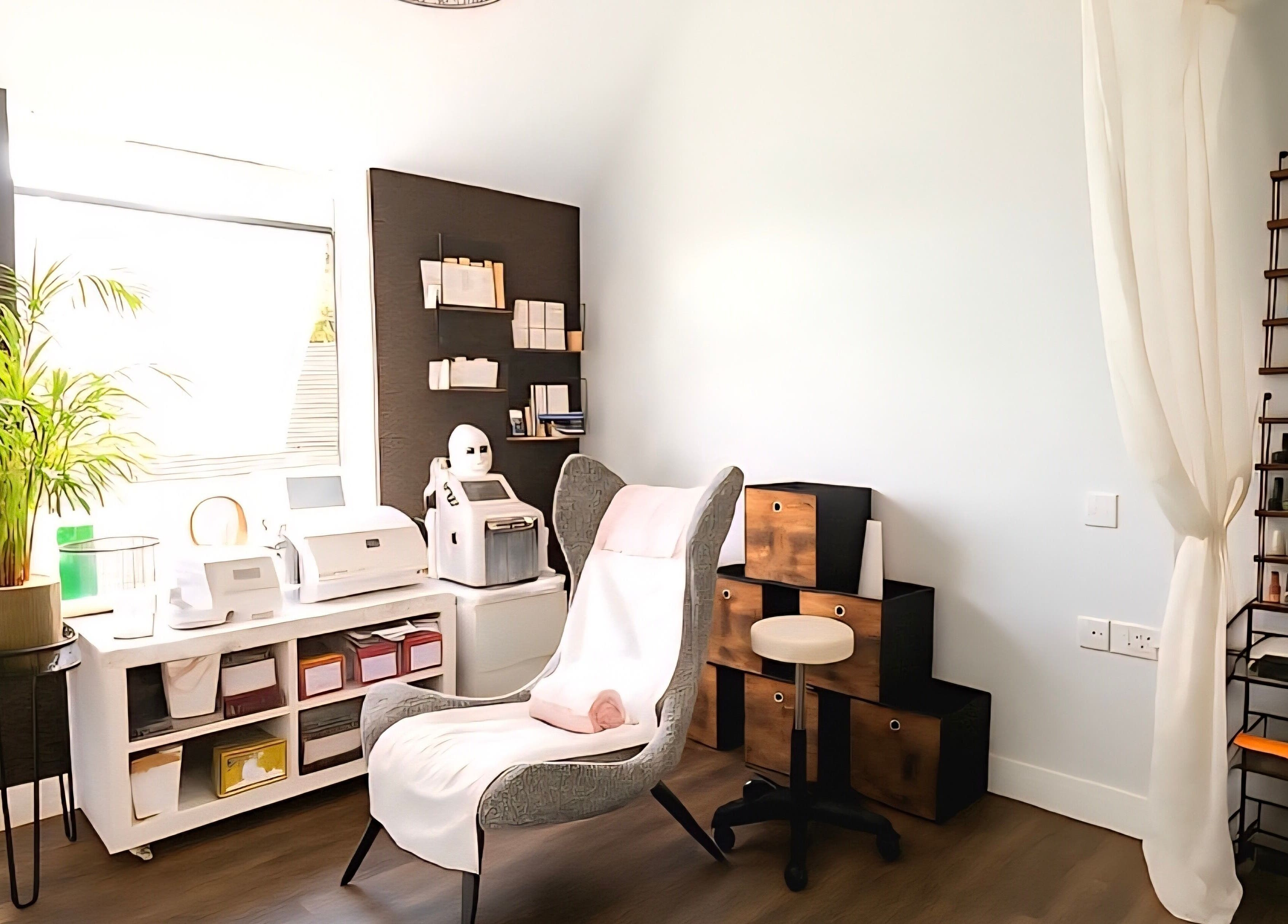 Chic therapy room at DERMEDICA Beauty Studio, Hertford, GB, with elegant decor and modern equipment.
