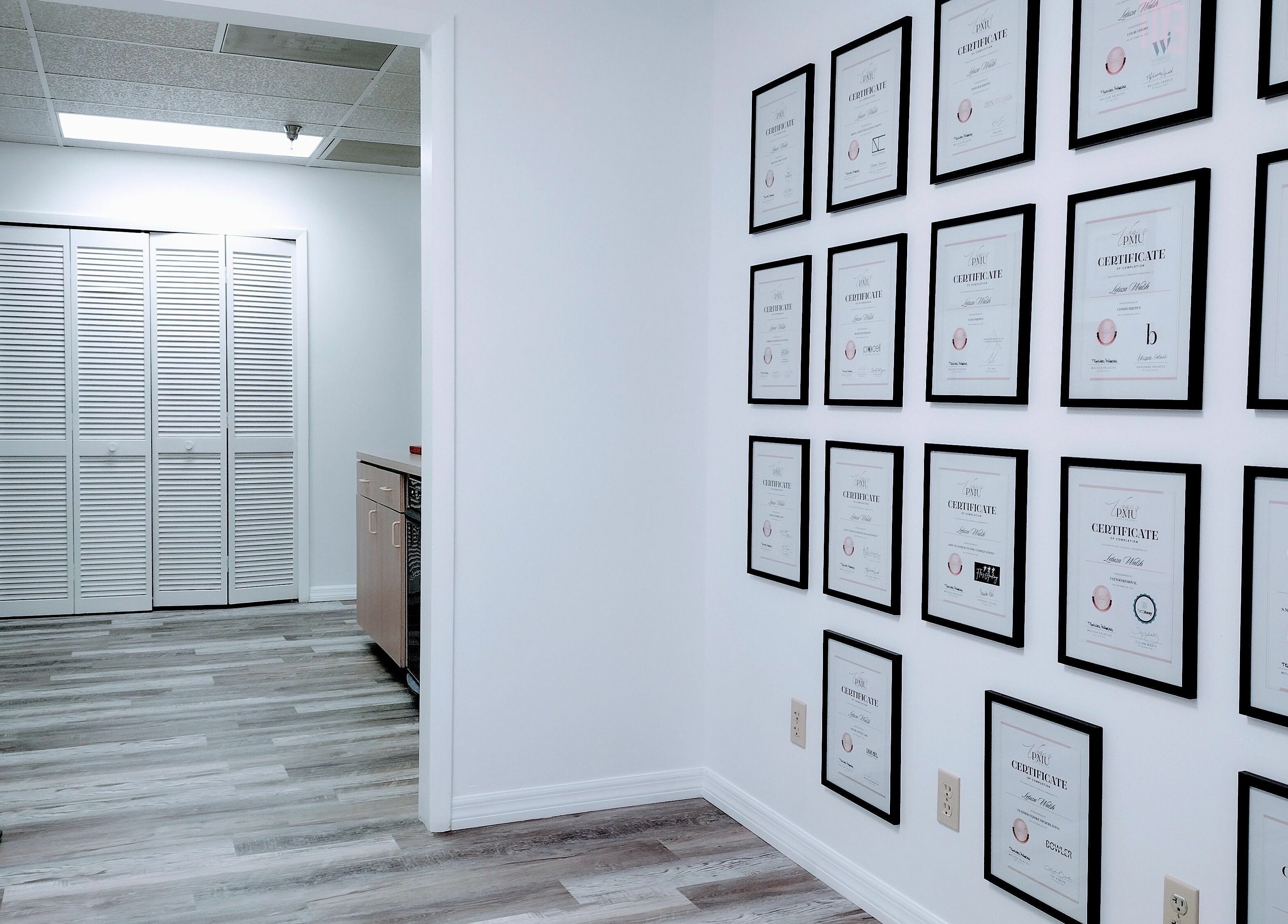 Wall of certificates at Shape It Body and Face, Fort Myers, Florida, US, showing expertise and professionalism.