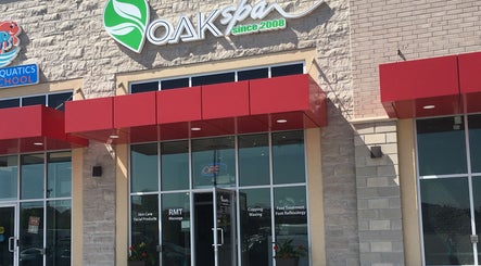 Oakspa Wellness Inc. entrance with red awning in Markham, Ontario, CA offering various wellness services.