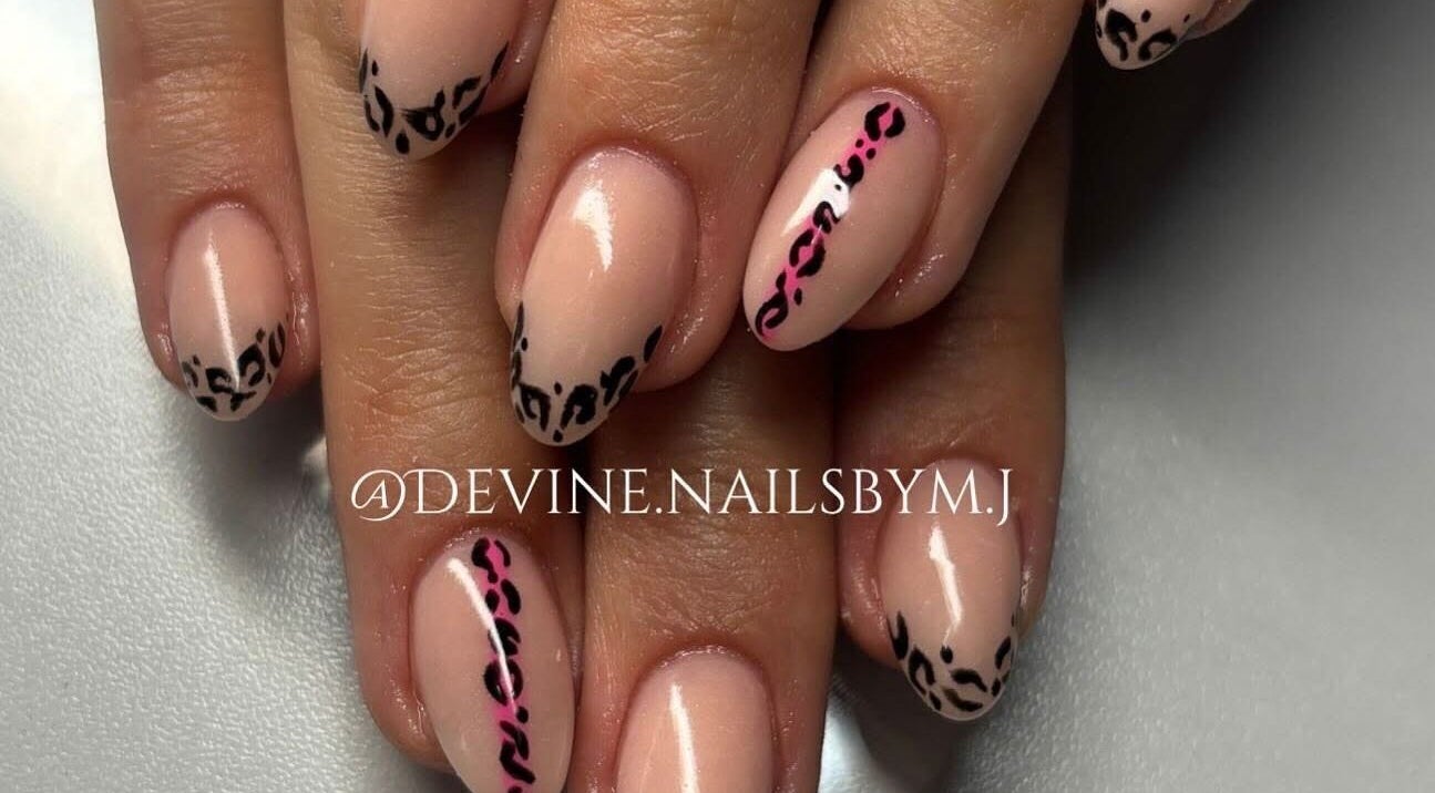 Elegant leopard-print nail art at Devine Nails by M J, Pretoria, Gauteng, ZA. Perfect blend of style and sophistication.