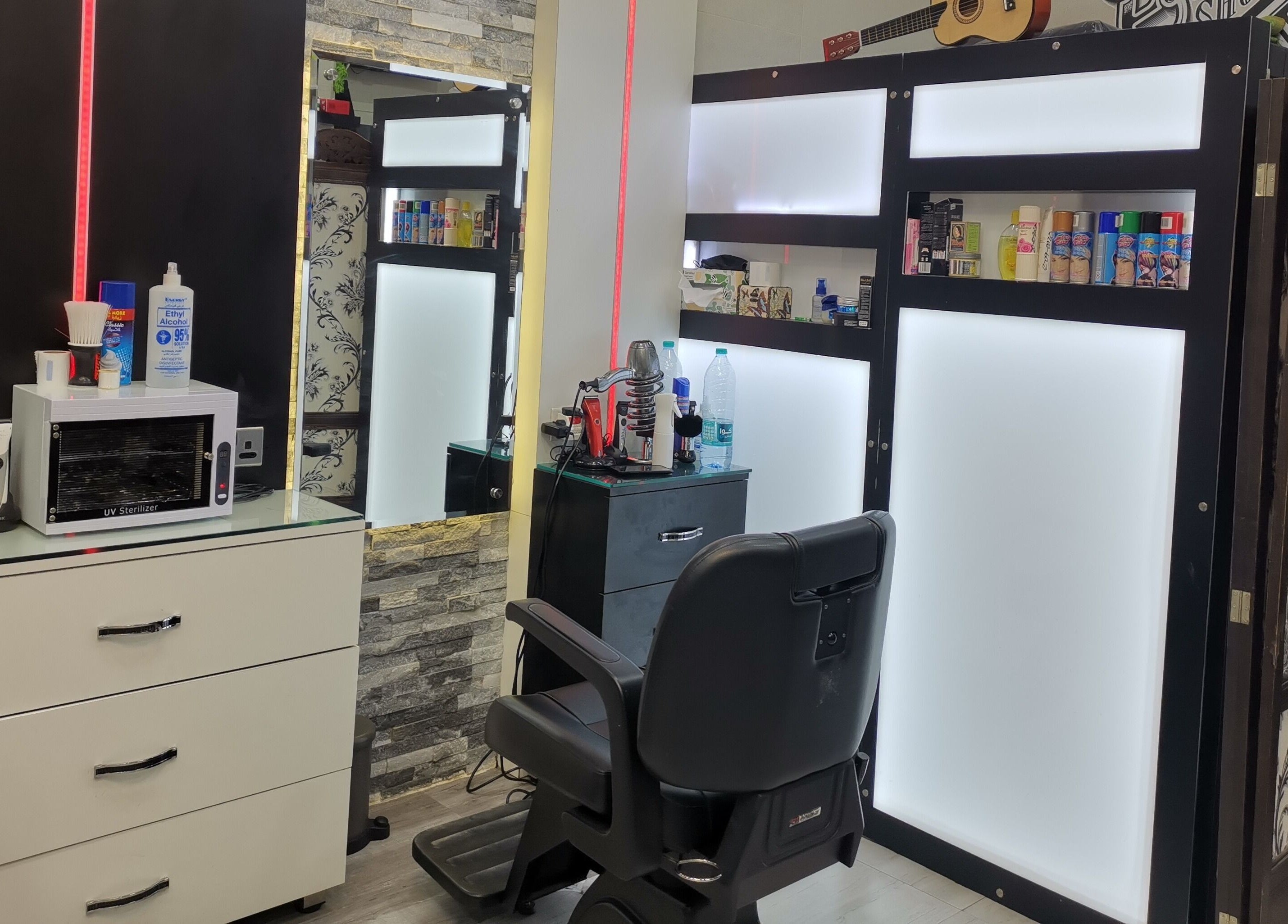 Modern grooming station at Kenchie Gents Salon Al Nahda, Dubai, AE, featuring sleek design and premium equipment.