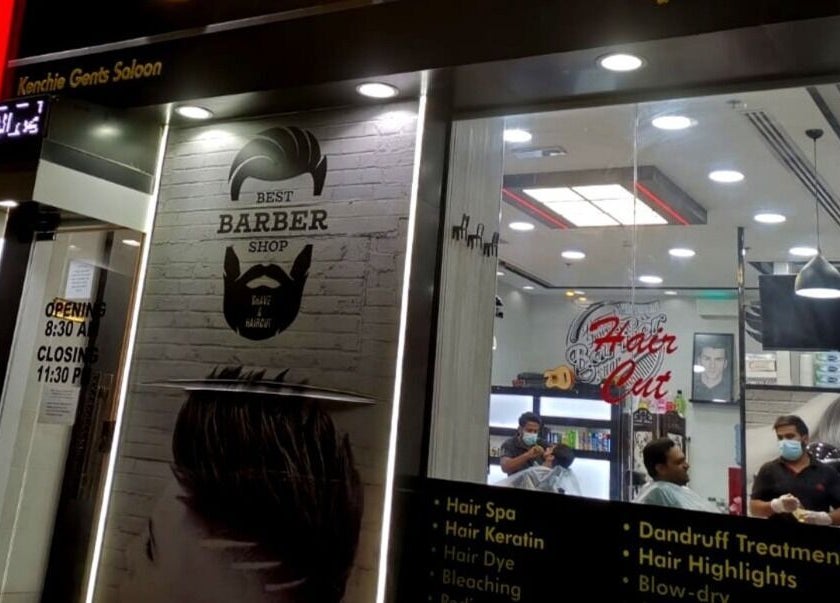 Entrance of Kenchie Gents Salon Al Nahda in Dubai, AE, showcasing modern barber services.