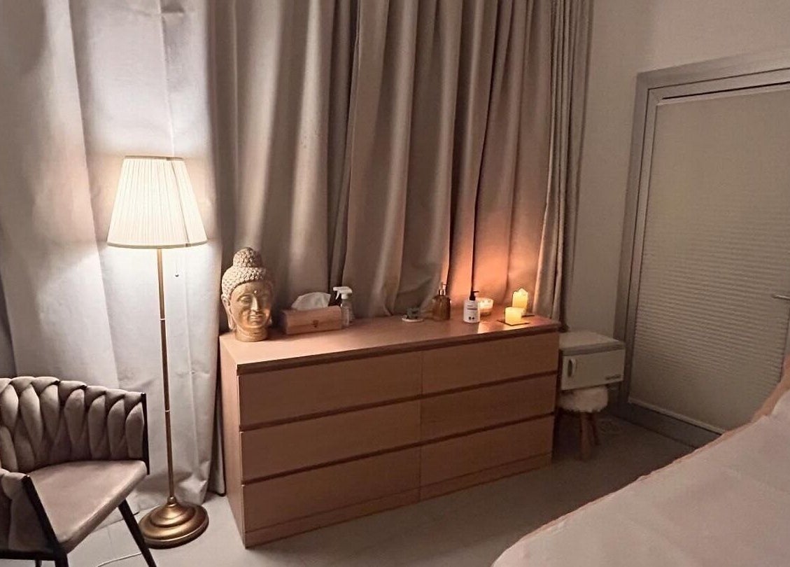 Relaxing corner at Nathal Lakatamia, features a cozy chair, Buddha statue, and candles. Lakatamia, Nicosia, CY.