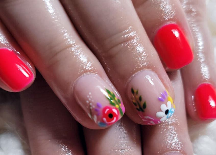 Vibrant floral nail art at Bella Nova Nail Studio, Letsitele, Limpopo, ZA showcasing professional design.