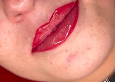 Vibrant red lips showcase Sian Carrie Studio's artistry in Chelmsford, England, GB, enhancing natural beauty.