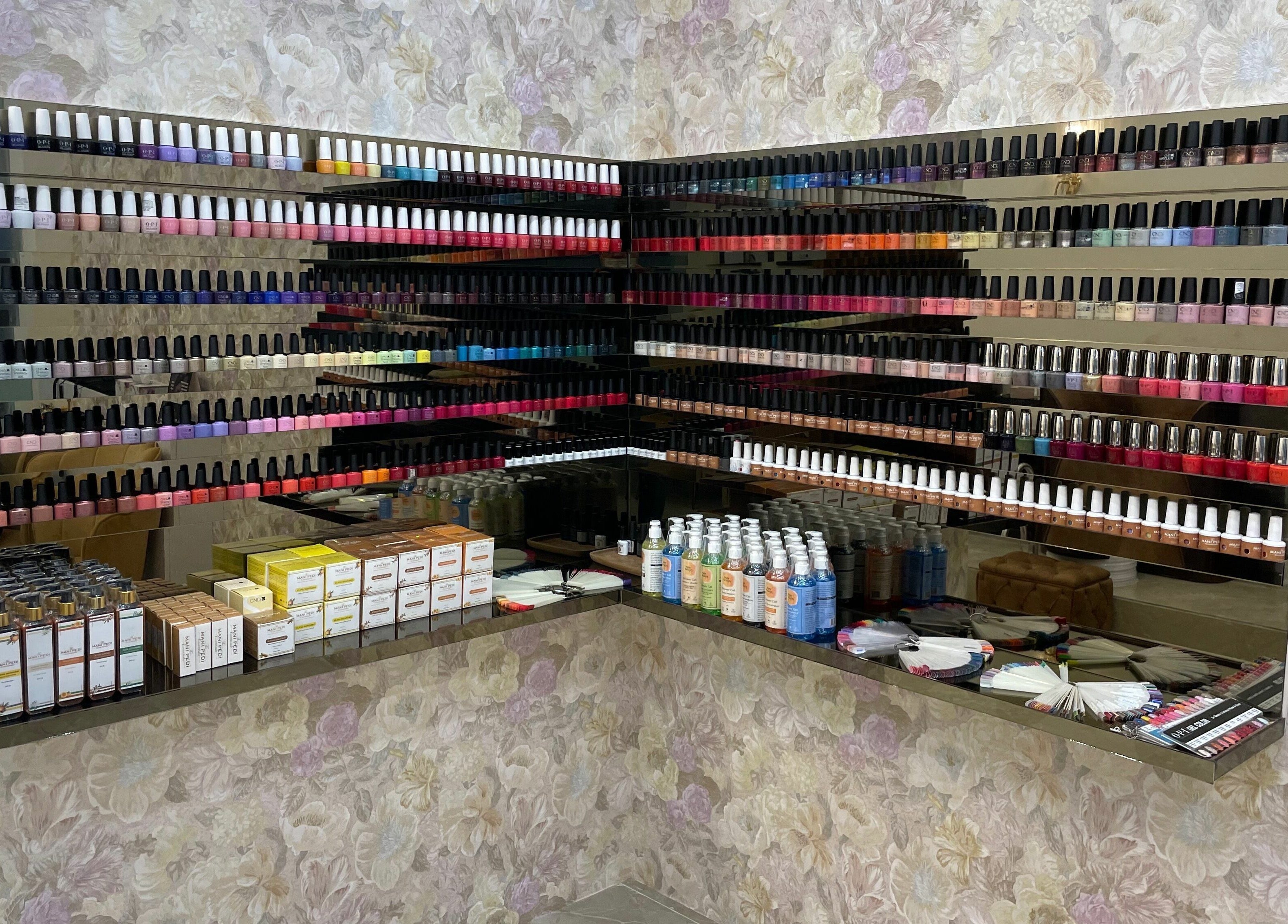 Colorful nail polish display at The Mani Pedi Spa, South Point Mall, DLF 5, Gurugram, Haryana, IN.