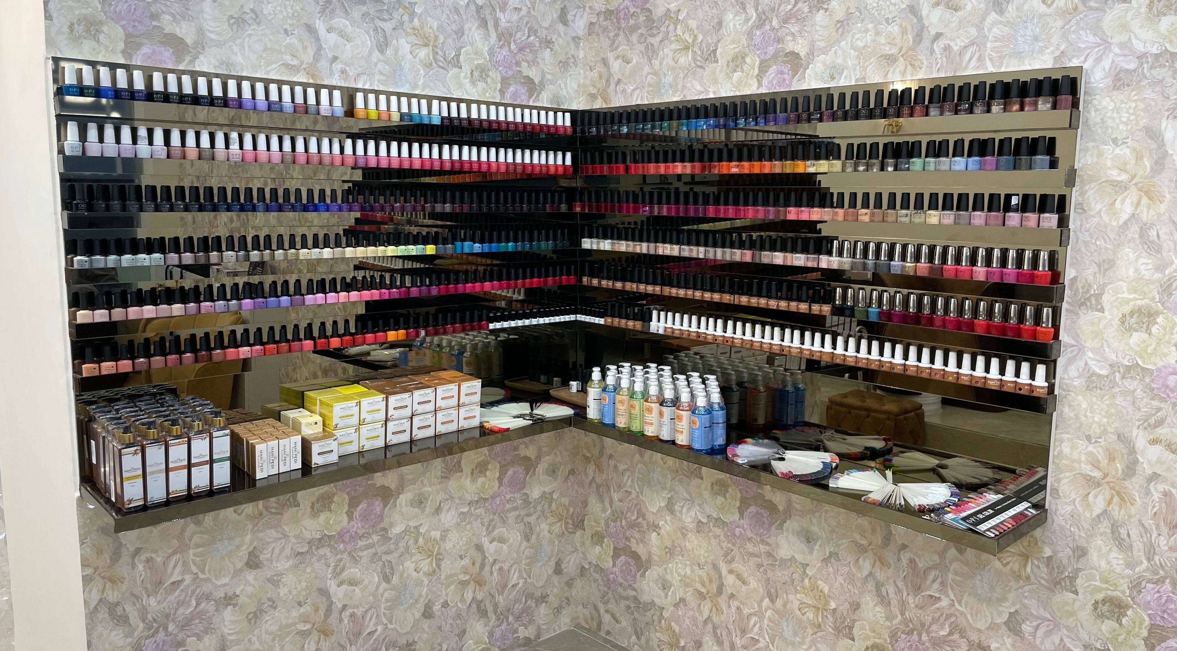 Colorful nail polish display at The Mani Pedi Spa, South Point Mall, DLF 5, Gurugram, Haryana, IN.