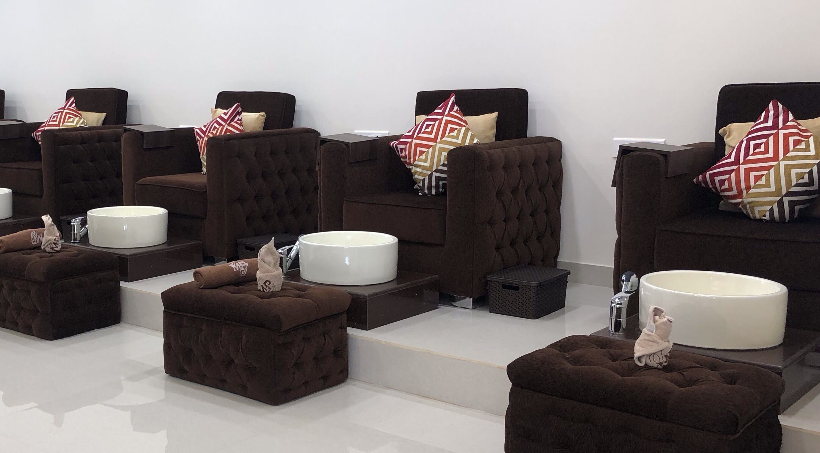 Luxurious pedicure chairs at The Mani Pedi Spa, Galleria Market, DLF 4, Gurugram, Haryana, IN, offering comfort.