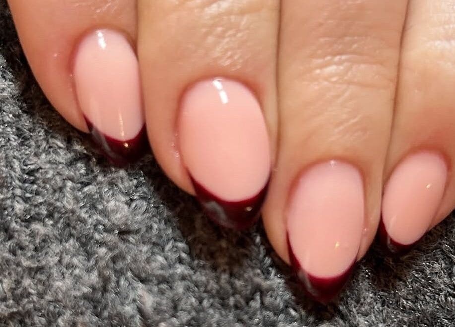 Elegant burgundy French pedicure at The LAB by Lisa, Helston, England, GB, showcasing nail art style.
