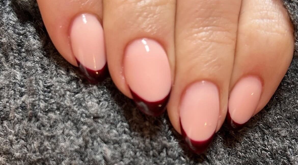Elegant burgundy French pedicure at The LAB by Lisa, Helston, England, GB, showcasing nail art style.