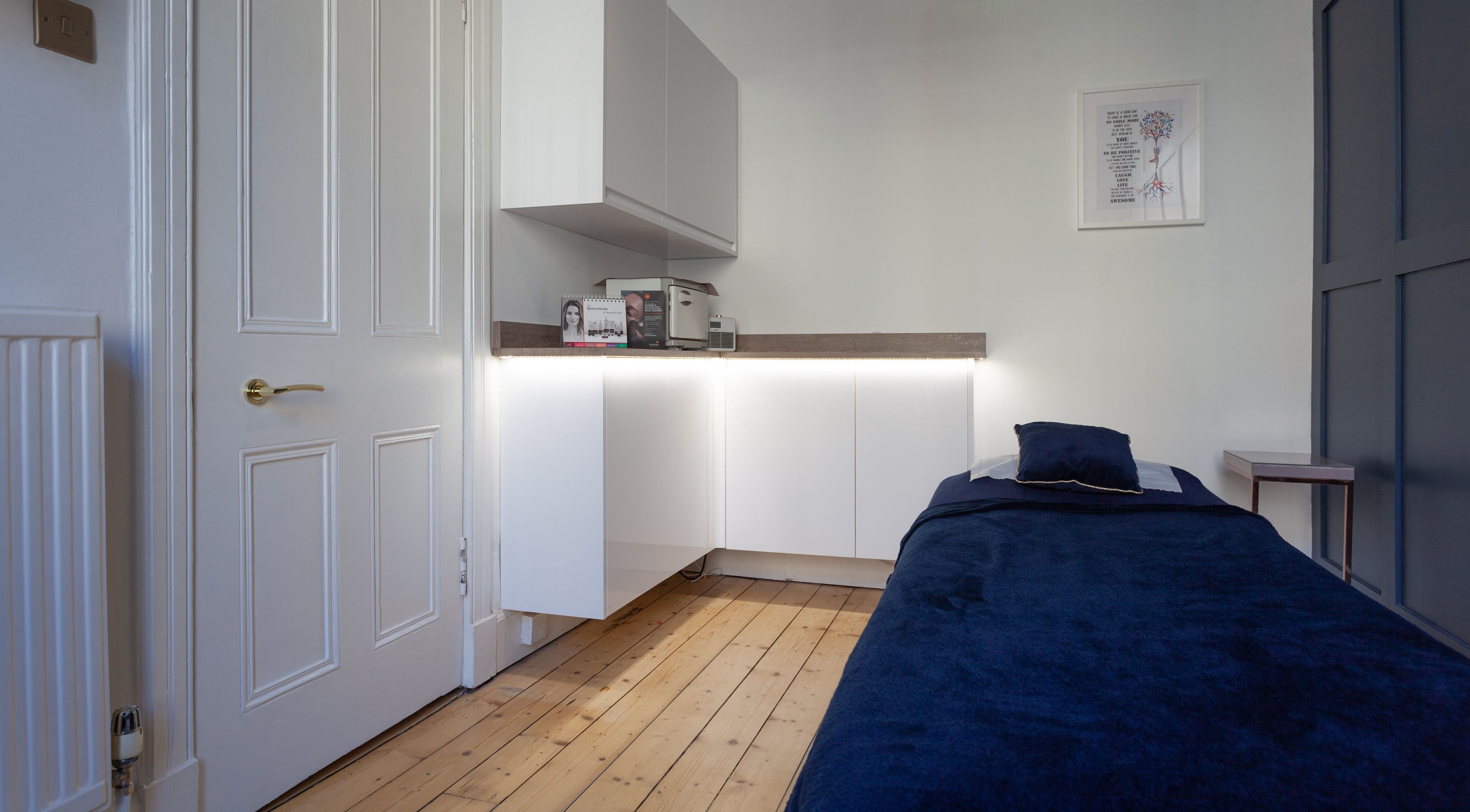 Calming therapy room at Soul Therapy Wellbeing, Edinburgh, Scotland, GB with minimalist decor and soft lighting.