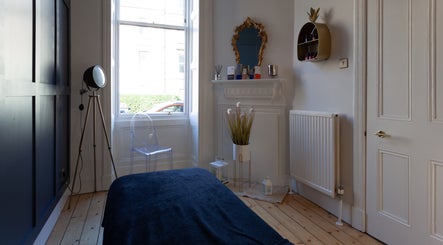 Relaxing room at Soul Therapy Wellbeing, Edinburgh, Scotland, GB. Features modern decor and cozy ambiance.