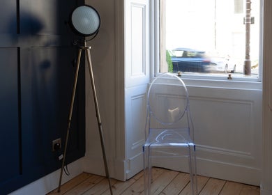 Chic seating area with clear chair and lamp at Soul Therapy Wellbeing, Edinburgh, Scotland, GB.