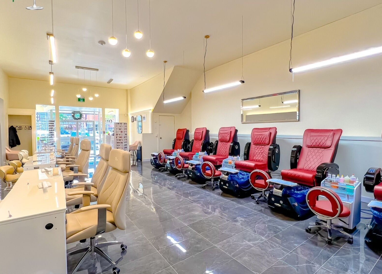 Interior of Solitude Nails Salon in Saskatoon, Saskatchewan, CA with plush pedicure chairs.