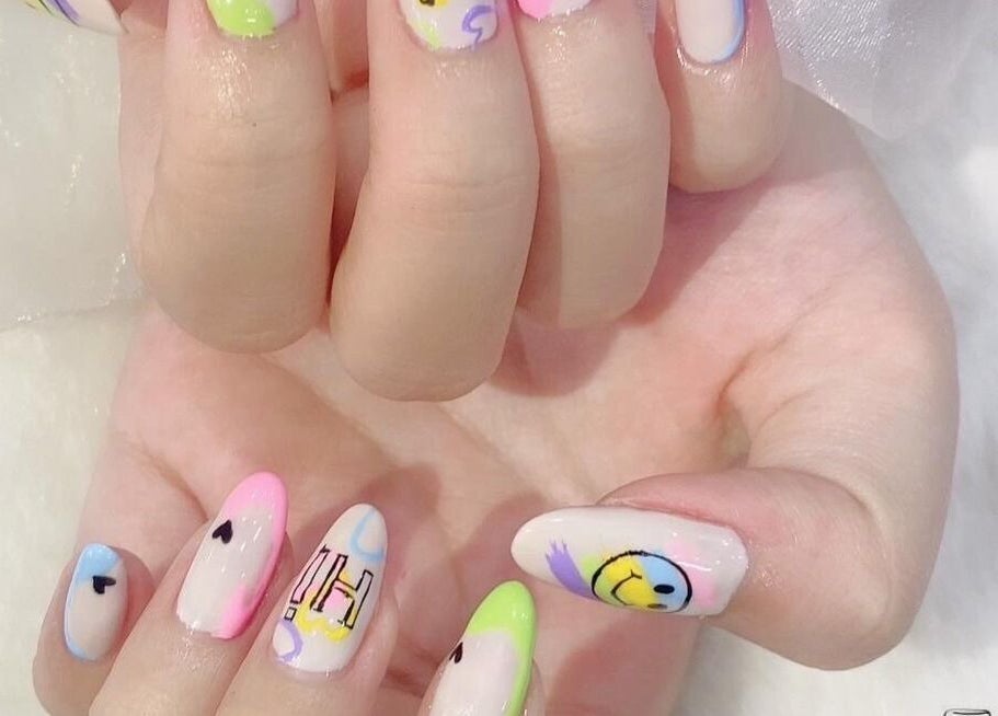 Colorful nail art at Solitude Nails Salon, Saskatoon, Saskatchewan, CA, showcasing unique and vibrant designs.