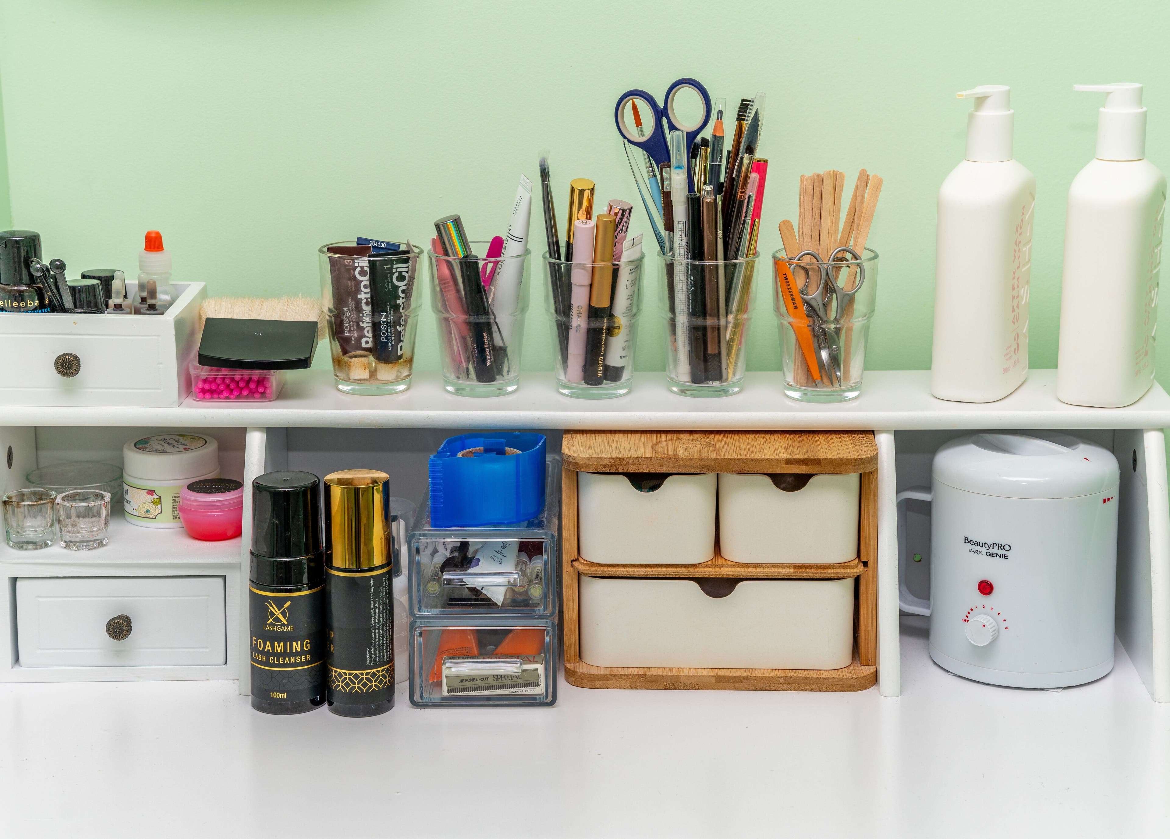 Beauty essentials neatly arranged on a shelf at Choi Lash and Brow, Lane Cove, New South Wales, AU.