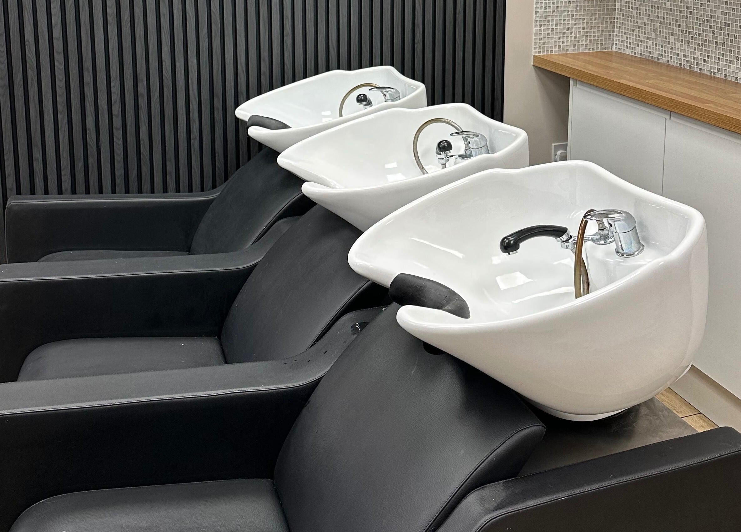 Stylish hair wash stations at Gorgeous Swindon in Blunsdon Saint Andrew, England, GB.