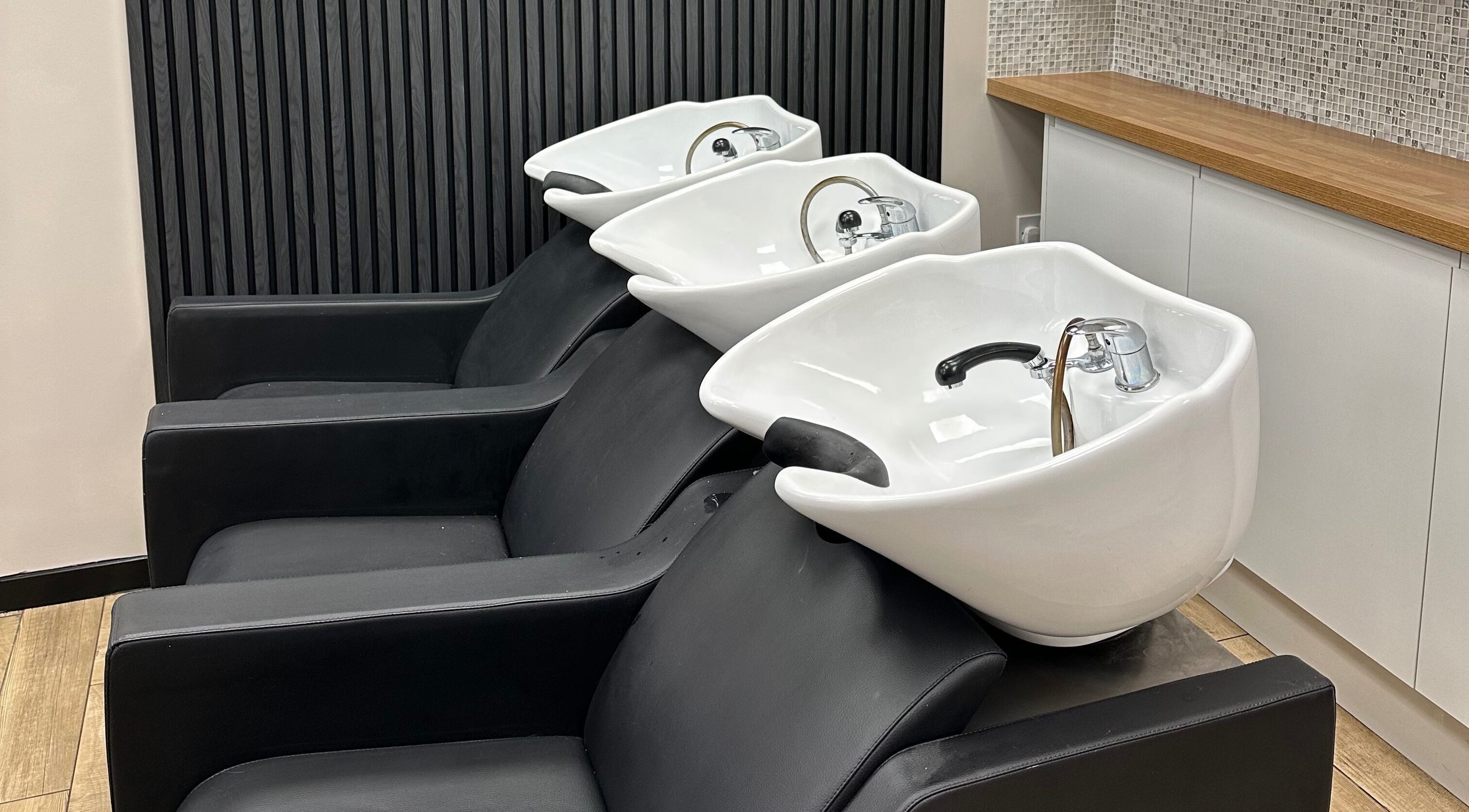 Stylish hair wash stations at Gorgeous Swindon in Blunsdon Saint Andrew, England, GB.