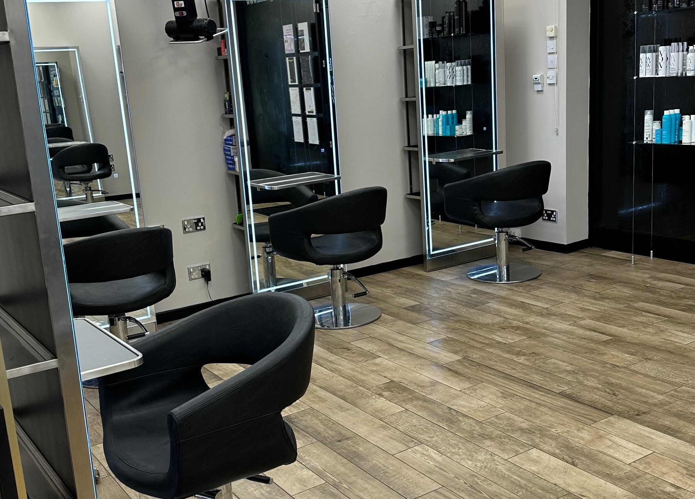 Chic salon interior at Gorgeous Swindon, Blunsdon Saint Andrew, England, GB with modern decor and sleek styling chairs.