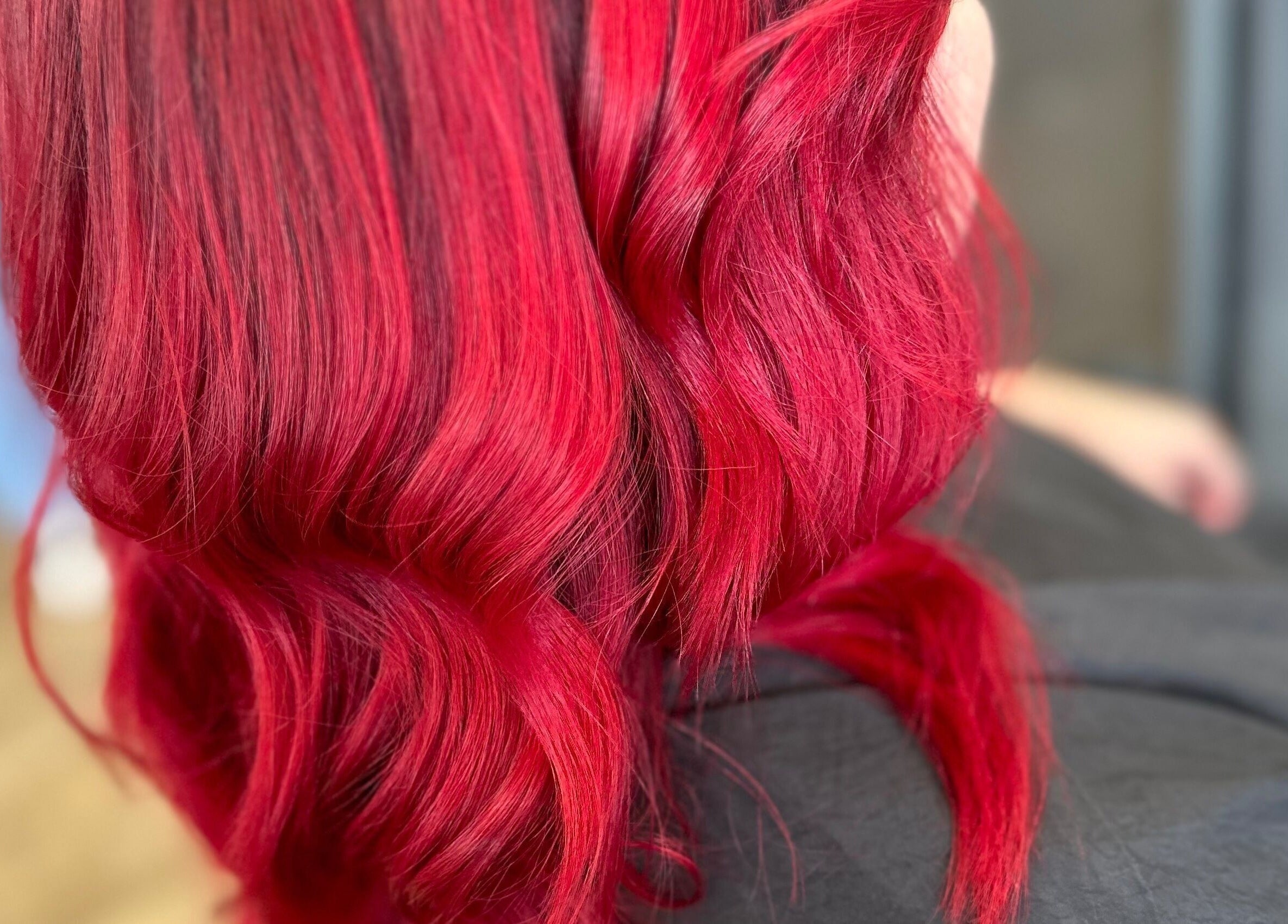 Vibrant red hair styled in waves at Gorgeous Swindon, Blunsdon Saint Andrew, England, GB.