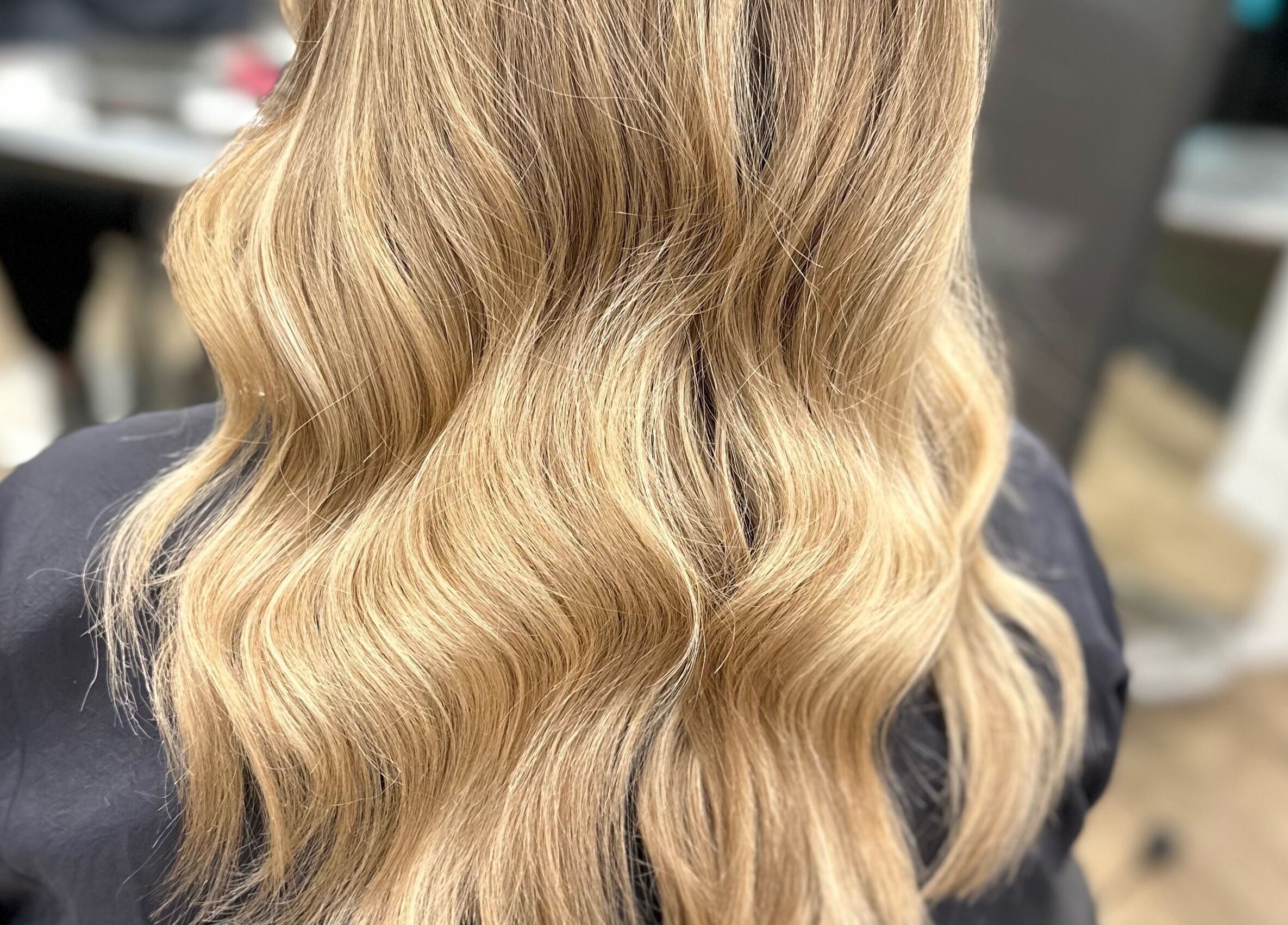 Luxurious blonde waves styled at Gorgeous Swindon in Blunsdon Saint Andrew, England, GB salon.