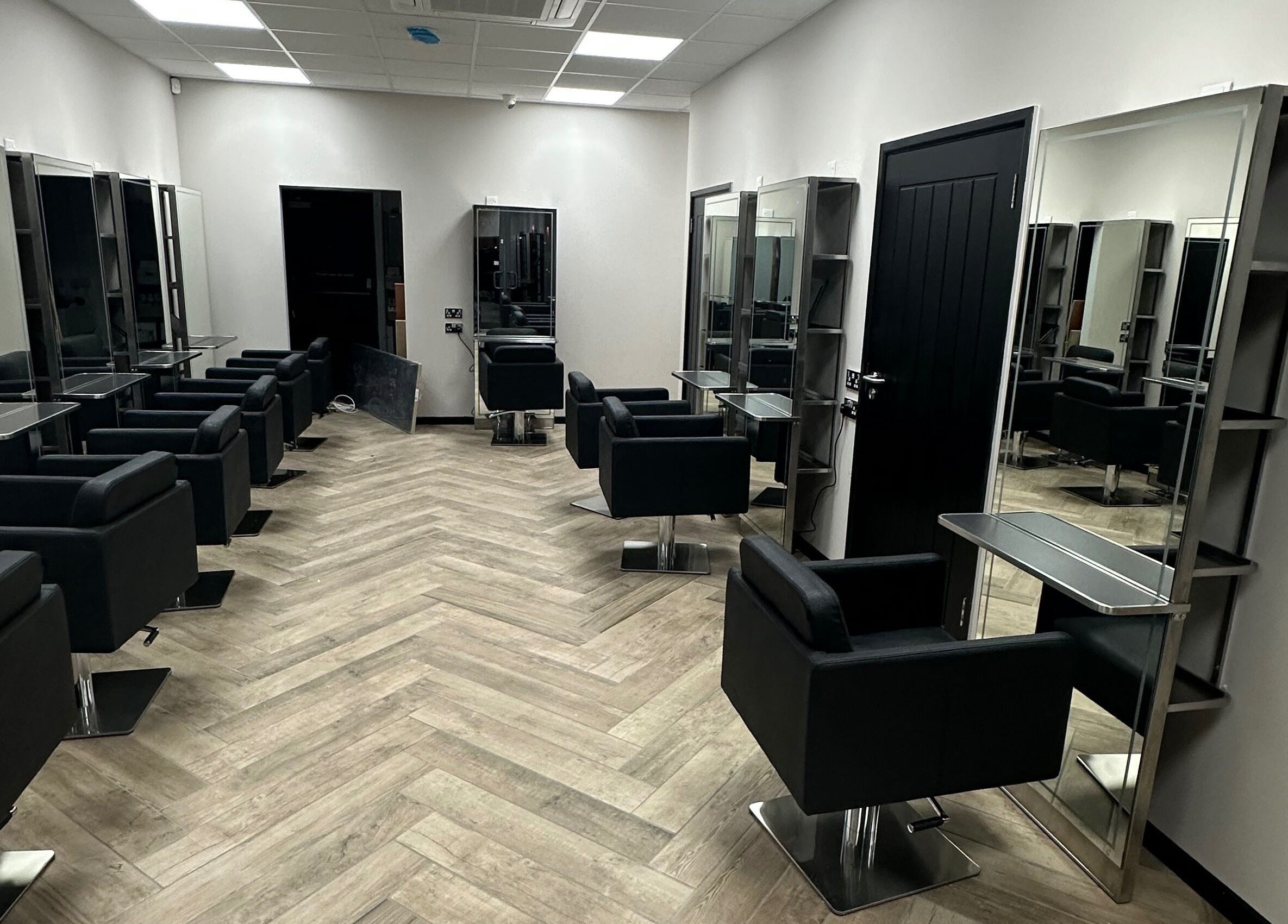 Modern salon interior with stylish chairs at Gorgeous Melksham, Melksham, England, GB.