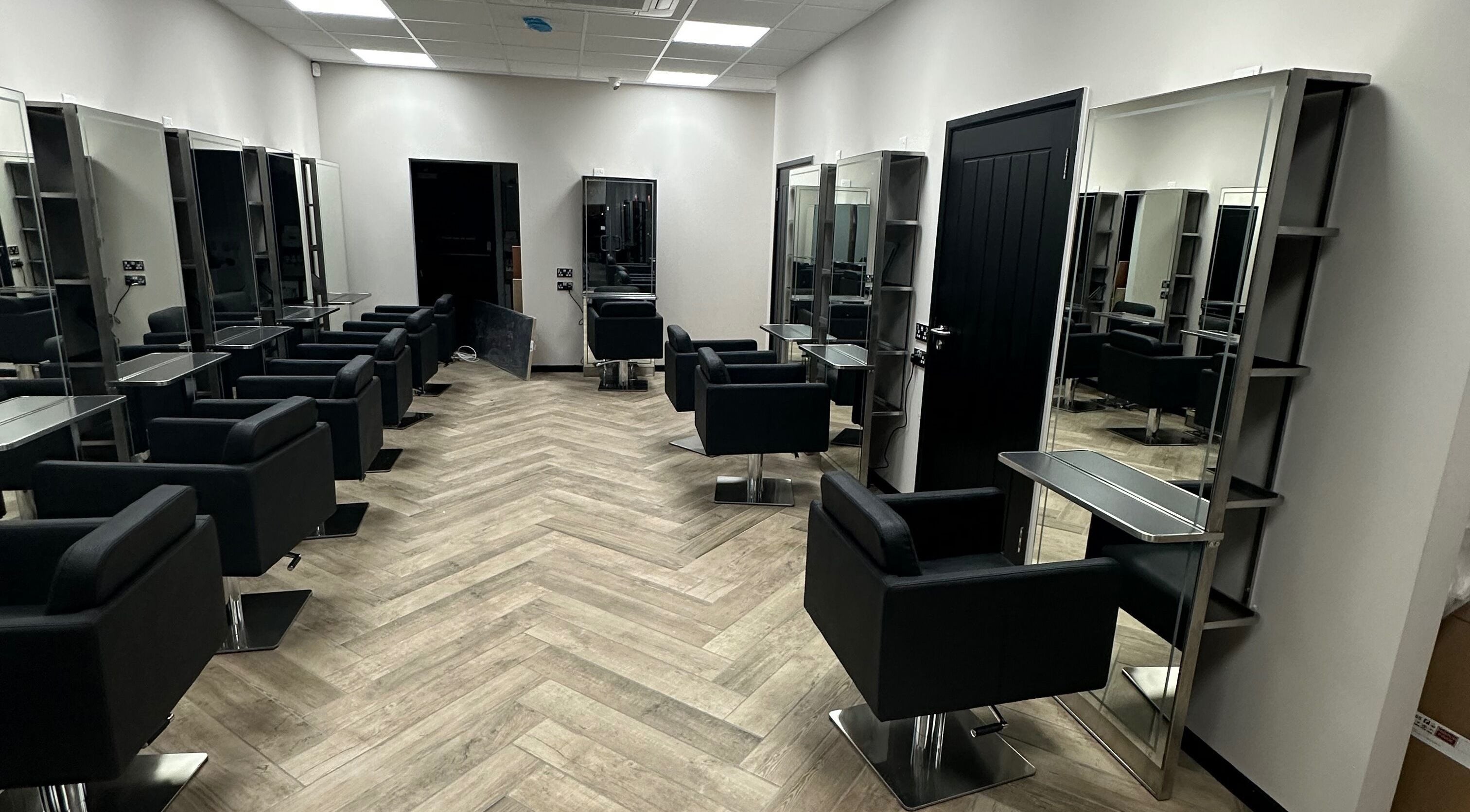 Modern salon interior with stylish chairs at Gorgeous Melksham, Melksham, England, GB.