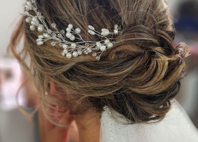 Bridal updo with pearl accessory at Jes Harrington Hair, Ennismore, Ontario, CA.