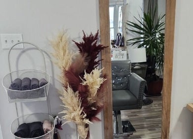 Cozy salon corner with decor at Jes Harrington Hair, Ennismore, Ontario, CA.