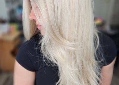 Blonde hair styled at Jes Harrington Hair, Ennismore, Ontario, CA, showcasing smooth finish.