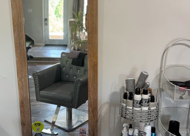 Hair styling chair and products at Jes Harrington Hair in Ennismore, Ontario, CA.