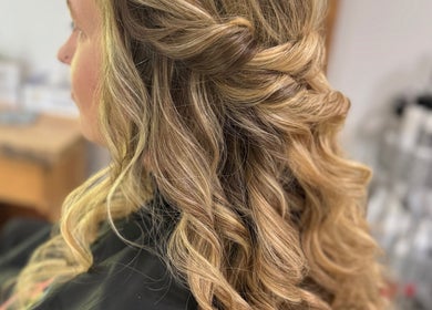 Elegant long blonde curls styled at Jes Harrington Hair, Ennismore, Ontario, CA salon.
