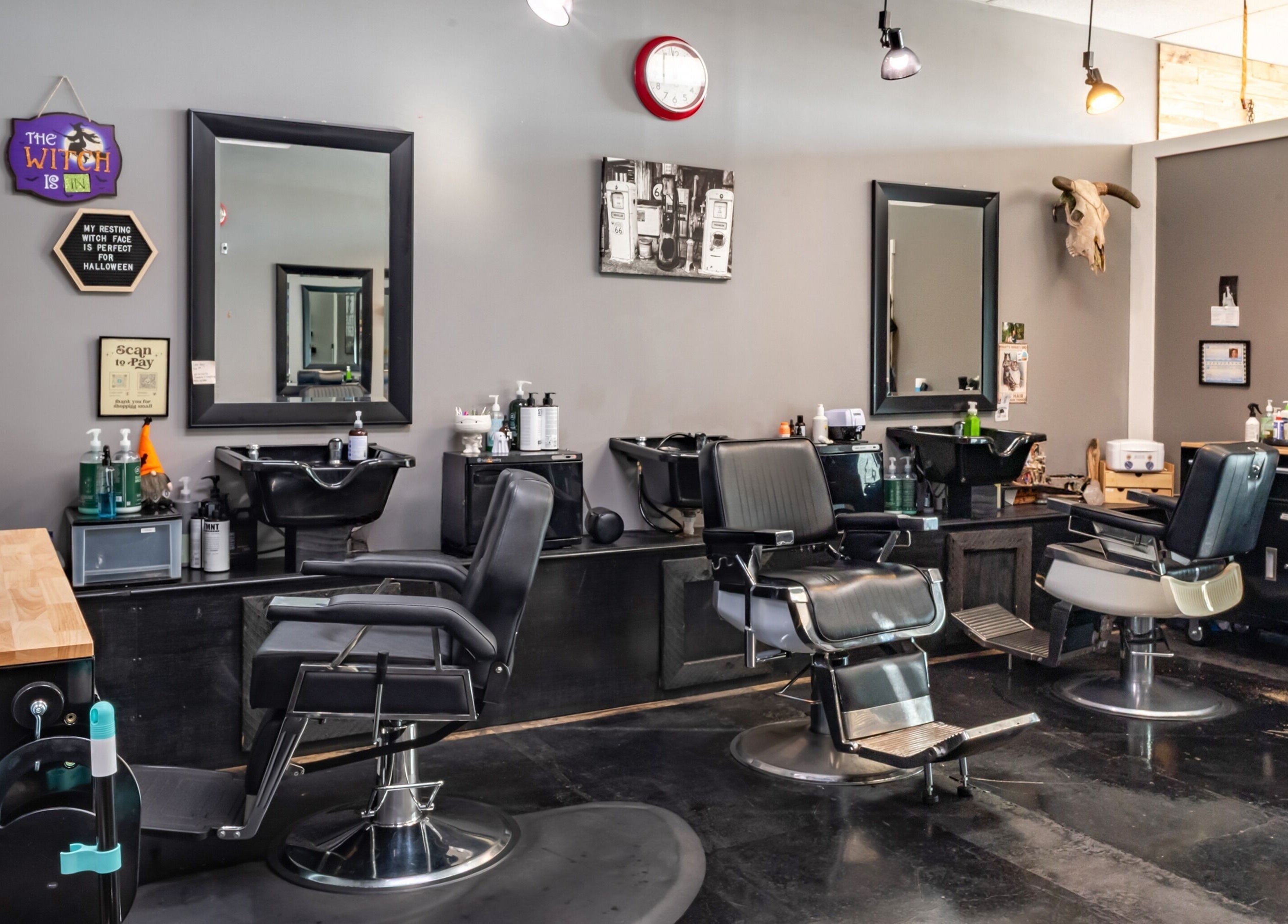 Modern interior of Grit Salon & Barbering in Pasco, Washington, US featuring sleek barber chairs and clean aesthetics.
