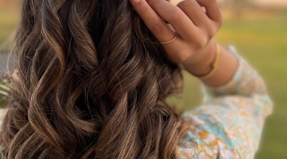 Beautiful curled hair styled at Galore Spa in Dubai, AE, showcasing elegant hair artistry.
