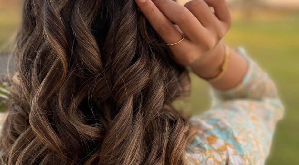 Beautiful curled hair styled at Galore Spa in Dubai, AE, showcasing elegant hair artistry.