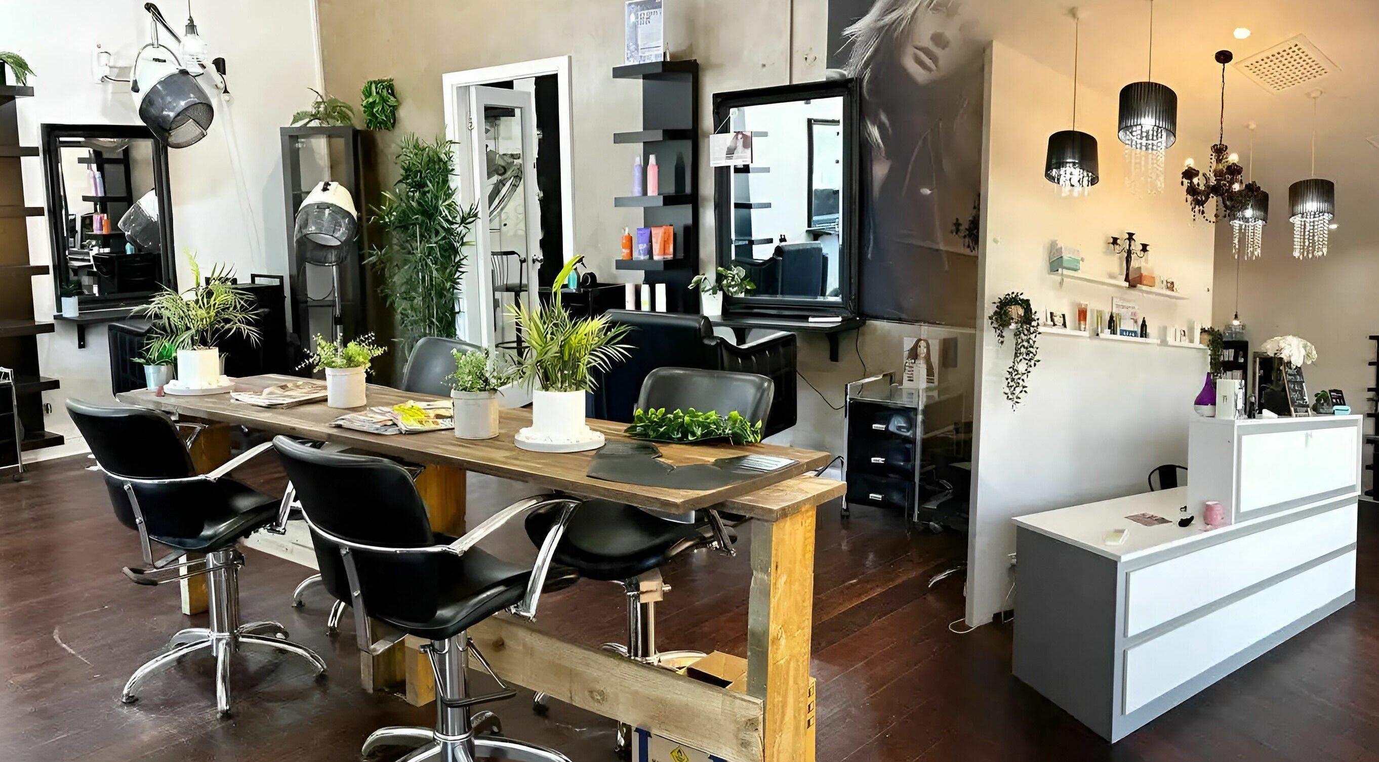 Chic interior of Unique Ink Hair & Beauty, Mandurah, Western Australia, AU featuring modern salon chairs and decor.
