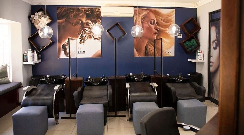 Elegant hair washing area at MC Hair Designs, Centurion, Gauteng, ZA with chic decor and modern facilities.