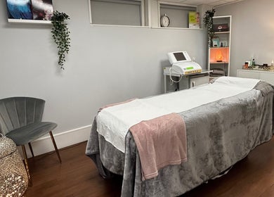 Cozy treatment room at Salon No.6 Hair And Beauty, Norwich, England, GB, featuring a plush massage bed.