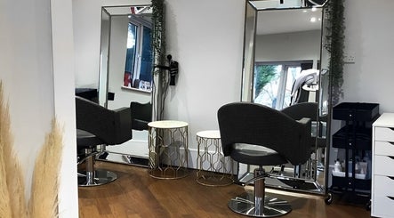 Modern salon chairs and mirrors at Salon No.6 Hair And Beauty, Norwich, England, GB.