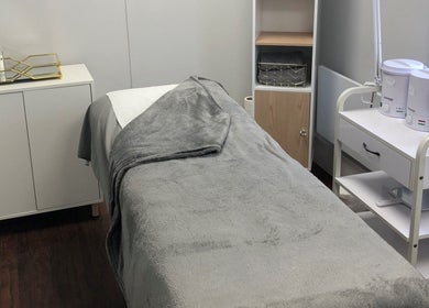 Cozy treatment room at Salon No.6 Hair And Beauty in Norwich, England, GB, with soft blankets and warm lighting.
