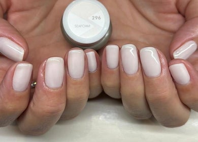 Beautifully manicured nails at Salon No.6 Hair And Beauty, Norwich, England, GB featuring a soft seafoam color.