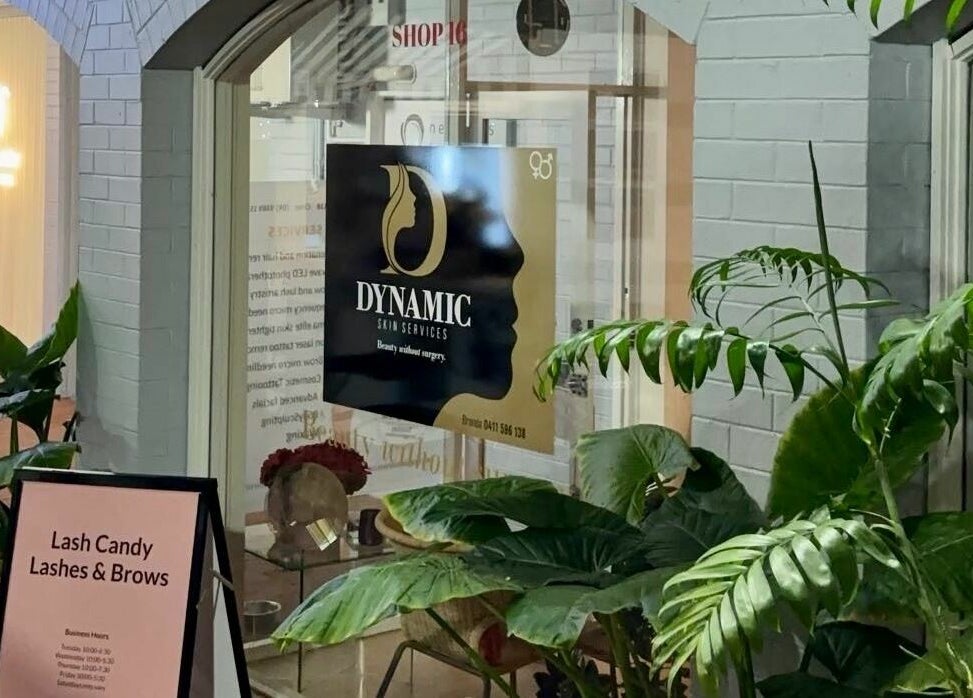 Entrance to Dynamic Skin Services in Crawley, Western Australia, featuring lush greenery and a vibrant atmosphere.