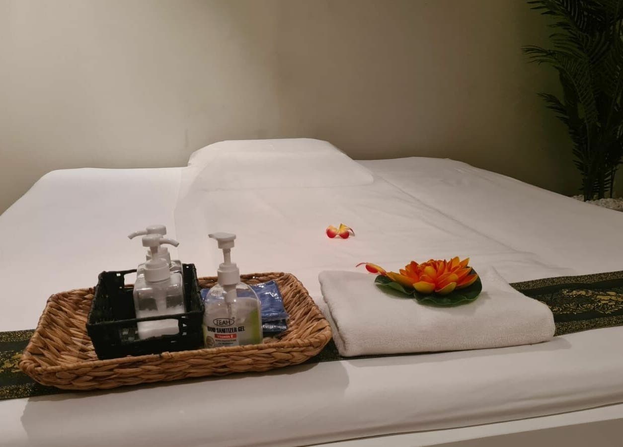 Tranquil massage table setup at Utopia Spa, Dubai, Dubai, AE with soothing ambiance.