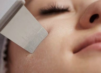 Facial treatment at Skin Revival with Leesa, Bowen, Queensland, AU. Close-up using a dermaplaning tool.