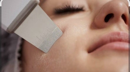 Facial treatment at Skin Revival with Leesa, Bowen, Queensland, AU. Close-up using a dermaplaning tool.