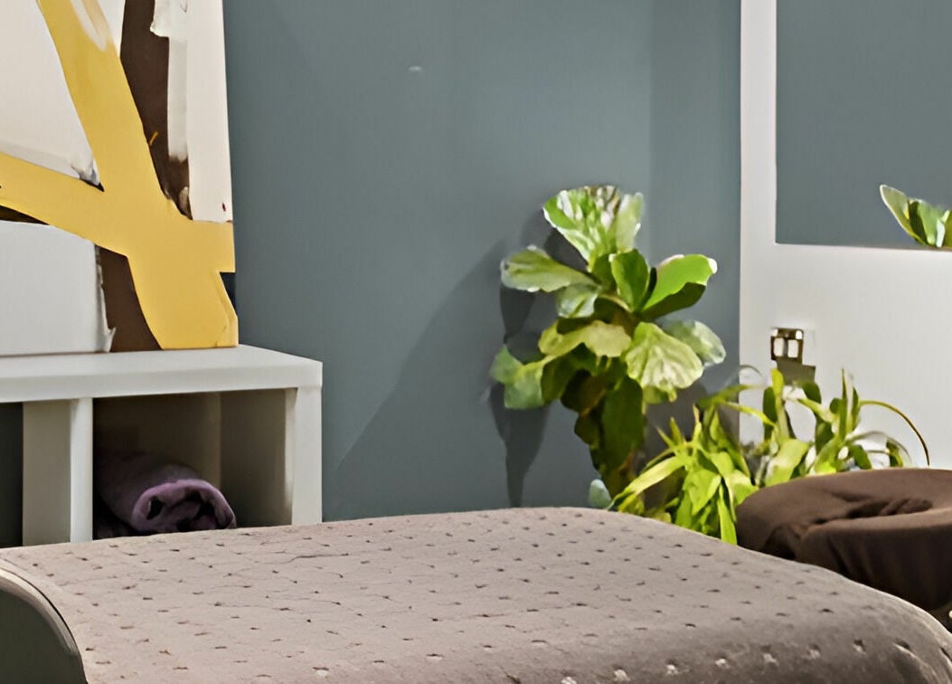Peaceful massage room at Quad Squad Massage Co, Rosebery, New South Wales, AU, with calming decor.