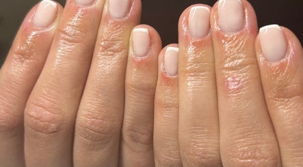Close-up of a glossy manicure at Gelsbyar.x in Grays, England, GB showcasing nail care.