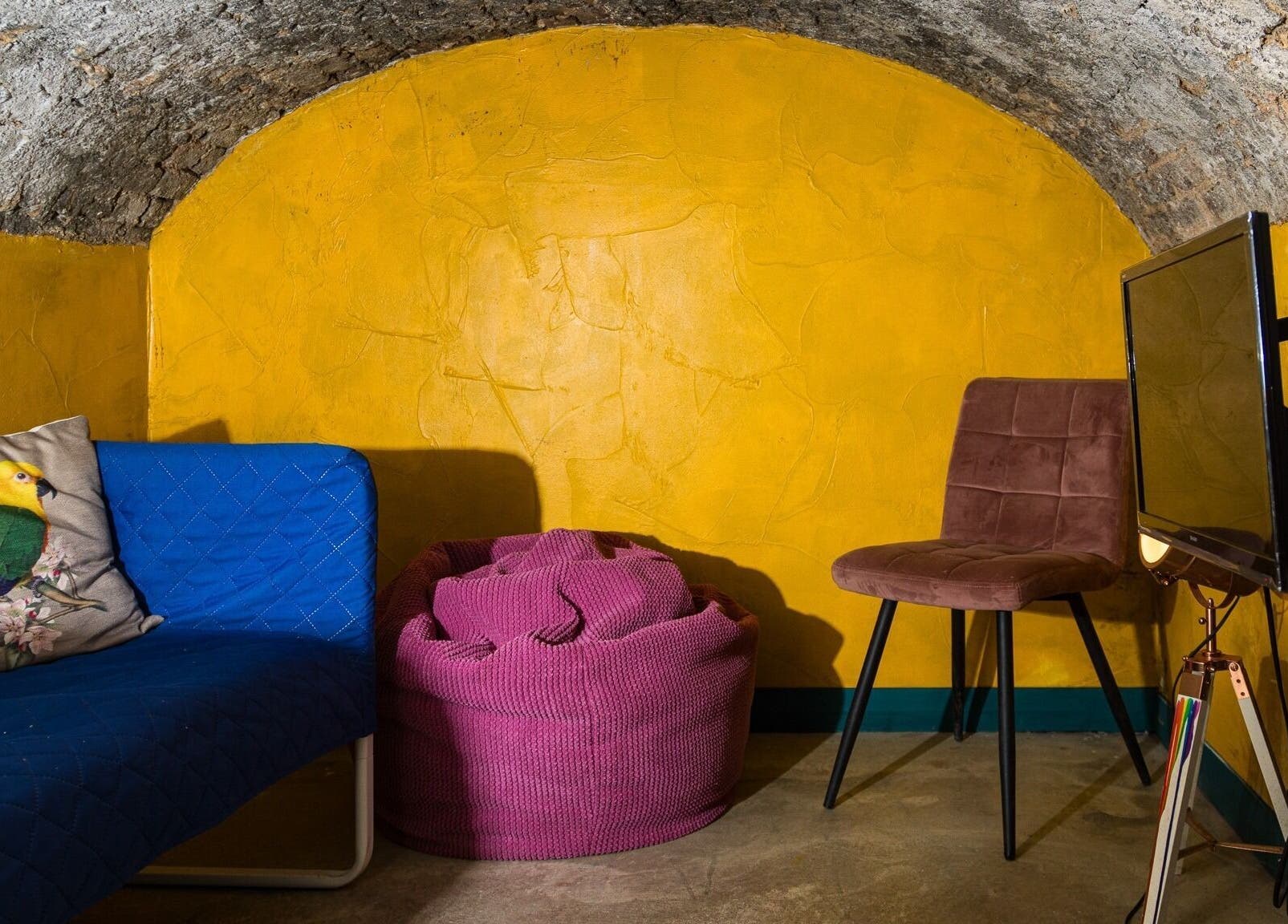 Cozy seating area with vibrant decor at Metamorph Haus, Liverpool, England, GB.