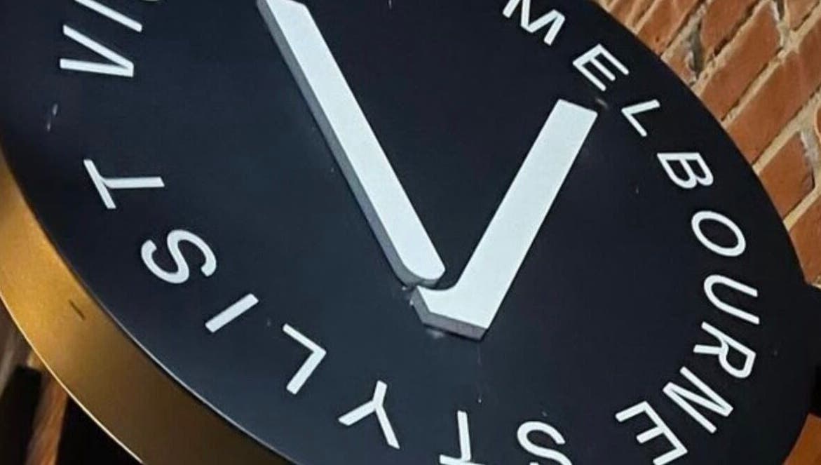 Victoria Melbourne Stylist sign at Melbourne, Victoria, AU, showcasing elegant logo and modern design.