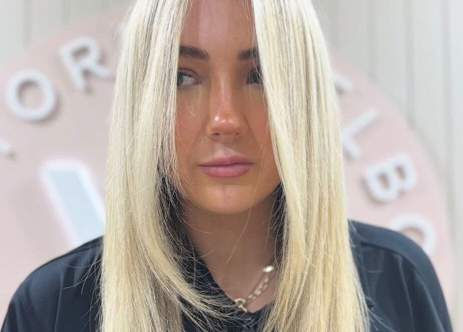 Blonde hair styled at Victoria Melbourne Stylist in Melbourne, Victoria, AU.